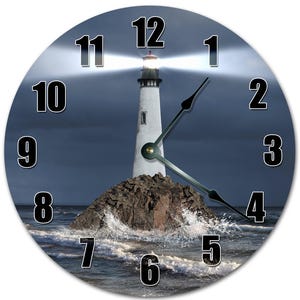 May include: Round wall clock featuring a lighthouse on a rocky island, with waves crashing around it. The lighthouse is white with a bright light shining. Black numbers mark the hours. The clock hands are black.