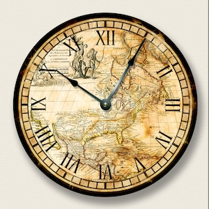 May include: Round wall clock featuring a vintage map design with Roman numerals. The clock face displays a detailed antique map in shades of beige and brown, with black clock hands and a dark brown frame.