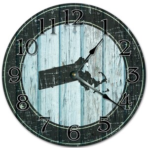 May include: Round wall clock with a distressed blue and black design. The clock face features a map of Massachusetts, black numerals, and black clock hands. The clock has a rustic, vintage aesthetic.