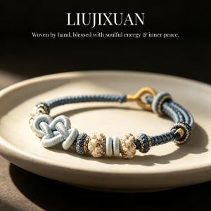 May include: A handcrafted blue and cream-colored bracelet with intricate knotwork and decorative beads. The bracelet features a gold-colored clasp and is displayed on a neutral-toned plate. The text "LIUJIXUAN" and a description are at the top.
