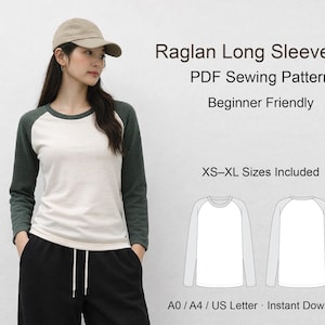 May include: A woman wearing a beige baseball cap and a raglan long sleeve tee with a white body and dark green sleeves. The text on the image reads "Raglan Long Sleeve Tee PDF Sewing Pattern Beginner Friendly XS-XL Sizes Included".