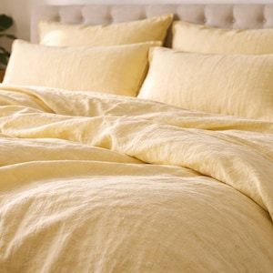 Set copripiumino in lino giallo pastello: biancheria da letto matrimoniale in morbido cotone lavato, copripiumino sostenibile.