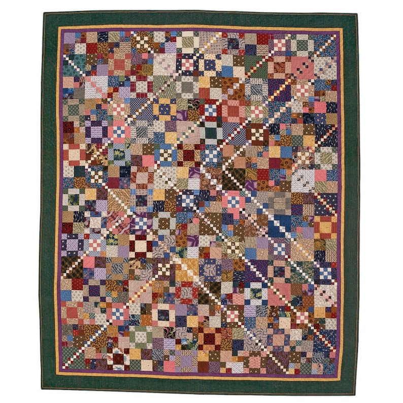 May include: A rectangular quilt featuring a complex patchwork design of numerous small squares in various colours and patterns. The quilt is framed by a thin yellow border, a purple inner border, and a wide dark green outer border.