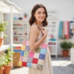 May include: A patchwork tote bag with a variety of colorful fabric squares. The bag has a floral and gingham pattern, with a light-colored background. The tote bag is carried over the shoulder.