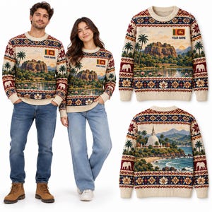 May include: A long-sleeve knit sweater featuring a scenic landscape of Sigiriya rock, palm trees, elephants, and the Sri Lankan flag. The design includes the text "YOUR NAME" and a patterned border with lotus flowers. The back displays a white stupa.