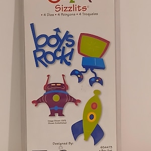 May include: Sizzix Sizzlits die set for crafting. The package features the text "boys Rock!" and includes die-cut shapes of a robot and a rocket ship. The set is designed for paper crafting and scrapbooking projects.