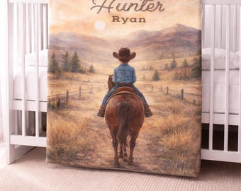 May include: A rectangular canvas print depicting a child on horseback in a rural scene. The print is inscribed with the name "Hunter Ryan". The child is wearing a cowboy hat and denim shirt. The background shows mountains and a sunset.