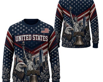 May include: A navy blue long-sleeve crewneck jumper featuring a printed design of the Statue of Liberty, a bald eagle, the Liberty Bell, and the New York City skyline. The text UNITED STATES is printed on the front with a small American flag.