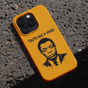 May include: Mustard yellow phone case featuring a black and white portrait and the text "TRUTH HAS A VOICE". The case has a glossy finish and a camera cutout.