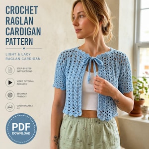 May include: A light blue crochet raglan cardigan with short sleeves, a scalloped edge, and a front tie closure. The text reads: Crochet Raglan Cardigan Pattern, Light & Lacy Raglan Cardigan, Step-by-step instructions, Video tutorial included, Beginner friendly, Customizable fit, PDF download.