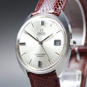 Orologio da uomo automatico OMEGA Seamaster Tool.107 Ref.166.026 con quadrante argentato, datario e cassa da 35 mm.