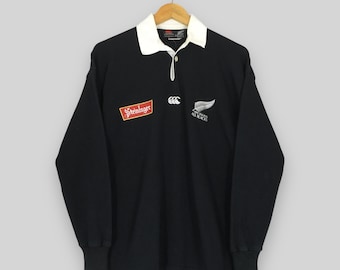 Vintage Steinlager Canterbury aus Neuseeland All Blacks Rugby-Hemd Kleines Canterbury Neuseeland Schwarzes Trikot