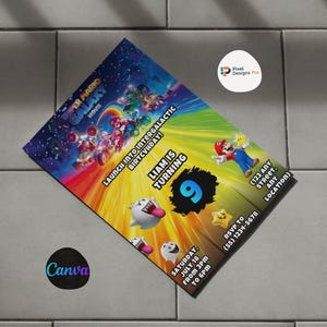 May include: A colorful Super Mario Galaxy movie-themed birthday party invitation. The design features Mario characters, the text "Liam is turning 9", and event details. The invitation is on a gray tiled surface.