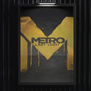 May include: Framed poster featuring the "Metro Last Light" logo. The artwork has a black background with a large gold-colored "M" shape and dripping paint effect. The game title is in gold lettering. The frame is black, and the background is a black, ridged wall.