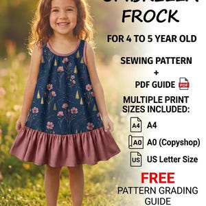 Può includere: Un cartamodello per un abito a campana per bambini dai 4 ai 5 anni, che include una guida in PDF e diversi formati di stampa: A4, A0 e US Letter. L'abito presenta un tessuto blu scuro con stampa floreale rosa e alberi dorati e un orlo a balze rosa.