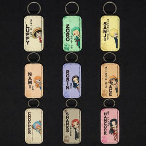 Chibi Anime One Piece Leather Keychain | Double-Sided Pirate Crew Keyring | 1.5” x 2.95” Faux Leather Bag Charm | Gift for Anime Fans