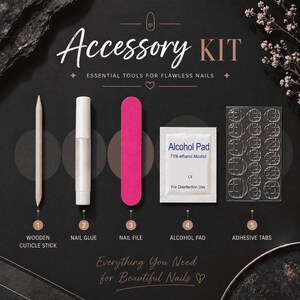 May include: An accessory kit for nails containing a wooden cuticle stick, a white tube of nail glue, a pink nail file, a white alcohol pad packet labeled 75% ethanol alcohol, and a clear sheet of adhesive tabs, all arranged on a dark surface.
