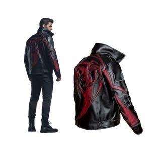 May include: Black leather jacket with red detailing and a distinctive design on the back and shoulders. The jacket has a wide collar and pockets. The image shows the jacket on a person and a separate view of the jacket.