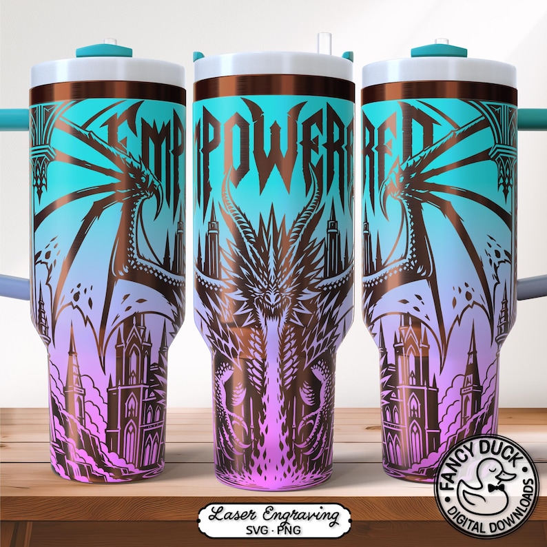 May include: A stainless steel tumbler with a dragon and castle design. The tumbler features a gradient of colors, including teal, purple, and brown. The words "EMPOWERED" are displayed on the tumbler.
