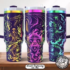 May include: Three insulated tumblers with fantasy designs. Each tumbler has a dark purple background with colourful illustrations of a dragon, archer, and a figure with a sword. The tumblers have a white lid and a rainbow-coloured rim.