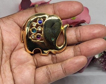 Broche vintage éléphant doré.Strass Multicolore