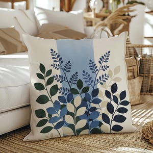 May include: A set of three ceramic mugs with a speckled, matte finish. The mugs are in shades of cream, light gray, and dark gray. Each mug has a simple, minimalist design, perfect for coffee or tea.