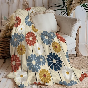 Puede incluir: Un juego de tres tazas de cerámica con un acabado mate moteado. Cada taza presenta un color diferente: azul claro, crema y gris. Las tazas tienen un diseño simple y moderno, perfectas para café o té.