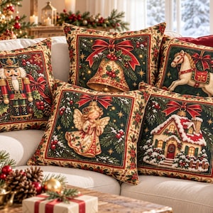 May include: A set of five square throw pillows featuring festive holiday imagery including a nutcracker, a golden bell, a rocking horse, an angel, and a snow-covered cottage. Each pillow has a dark green center with red and gold decorative borders.