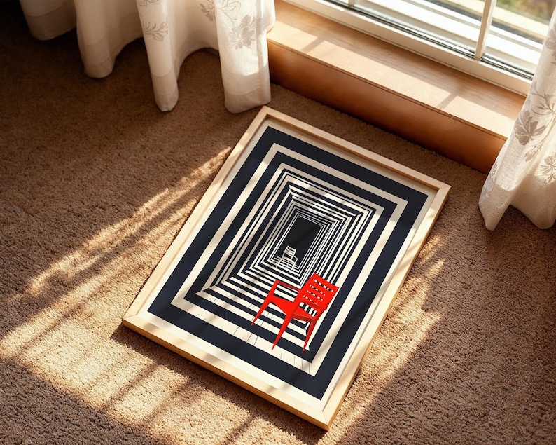 May include: A framed print featuring a black and white graphic illustration of a repeating rectangular tunnel pattern. A single bright red chair is positioned in the foreground, while a smaller white chair is visible in the distance.