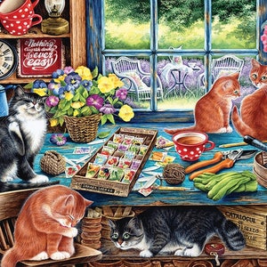 May include: A colorful painting of a kitchen scene with three cats, a window with a view of a garden, and a sign that reads "Nothing worth doing is ever easy".