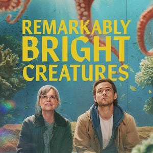 May include: Movie poster for "Remarkably Bright Creatures" featuring two people in front of an aquarium. The title is in large yellow letters. An octopus and coral are visible in the background. The overall color scheme is blue, yellow, and brown.