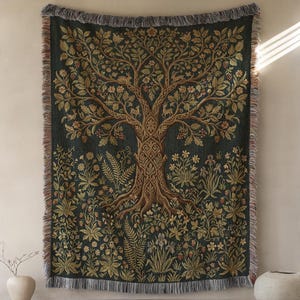 May include: A large tapestry featuring a detailed tree design with intricate branches, leaves, and flowers in shades of brown, green, and gold against a dark green background. The tapestry has a fringed edge and is displayed on a wall.