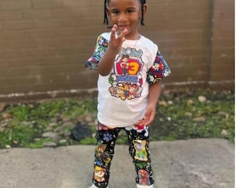 Conjunto de atuendos para fiesta de cumpleaños con temática de cachorros