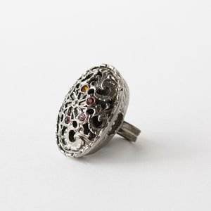 Silver tone Poison ring with filigree detail and sparkly tiny faceted gems vintage costume jewelry