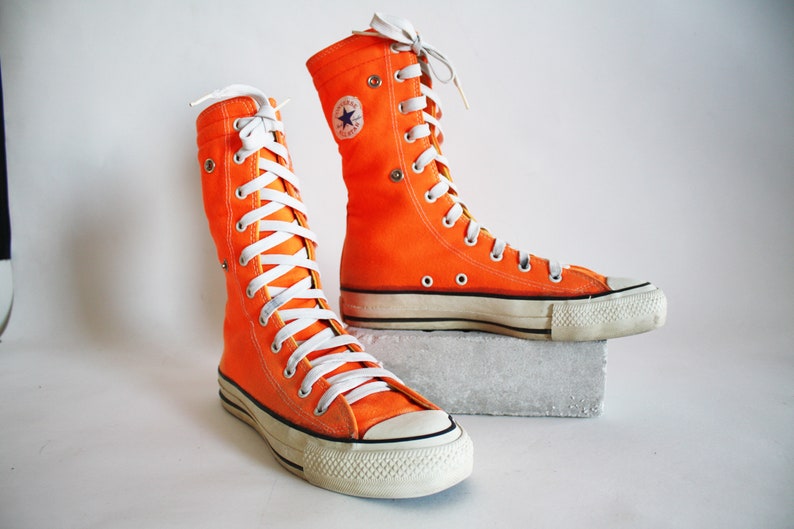 neon orange converse high tops