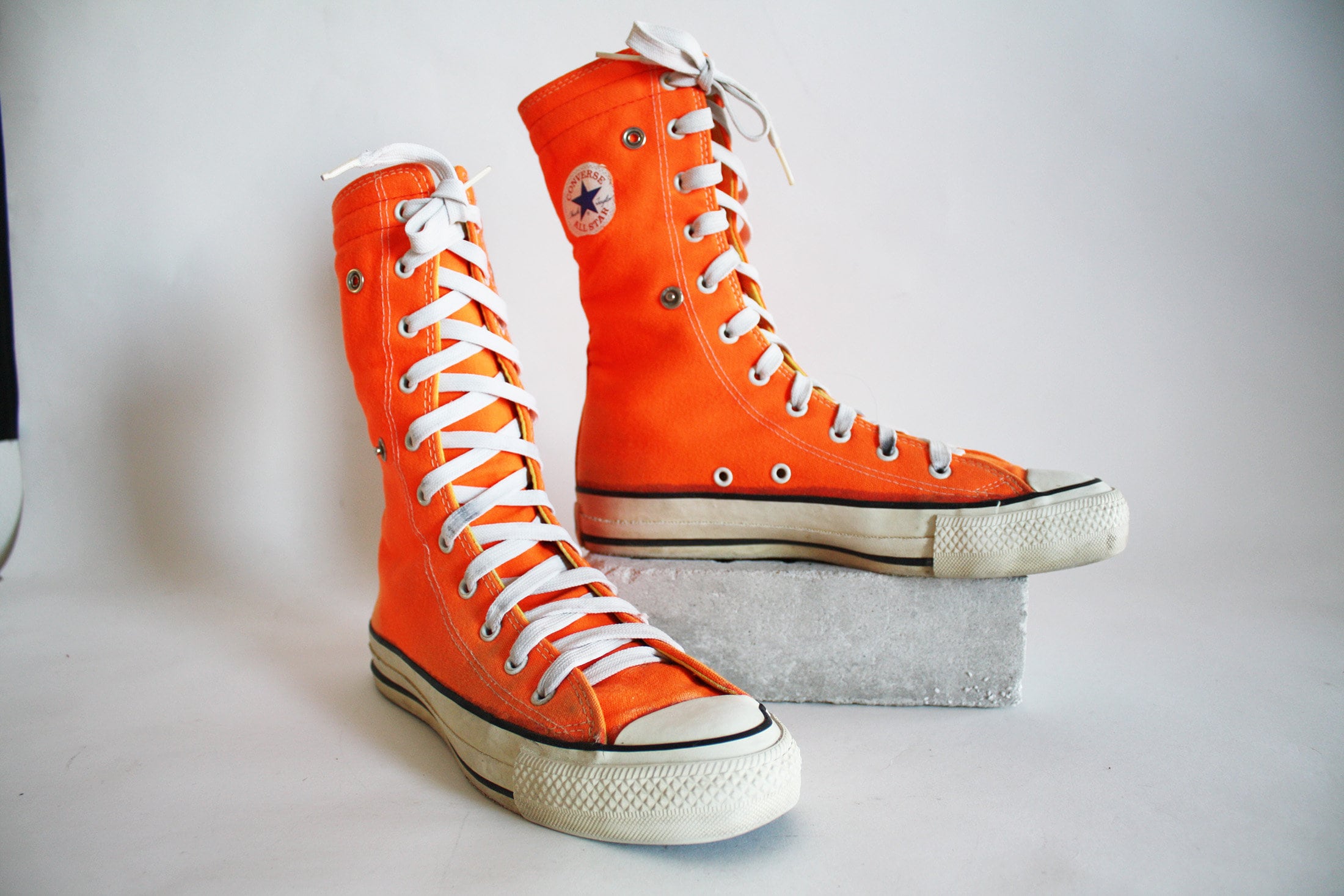 bright orange converse high tops