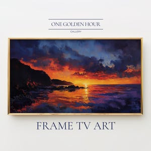 May include: A framed landscape painting depicts a vibrant sunset over the ocean. The sky is filled with fiery orange and red hues, contrasted by dark blue clouds. The artwork is labeled "ONE GOLDEN HOUR GALLERY" and "FRAME TV ART".