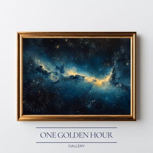 May include: A framed print featuring a vibrant depiction of a nebula in shades of blue and gold. The artwork is set within a gold-colored frame. The text "ONE GOLDEN HOUR GALLERY" is displayed below the artwork.
