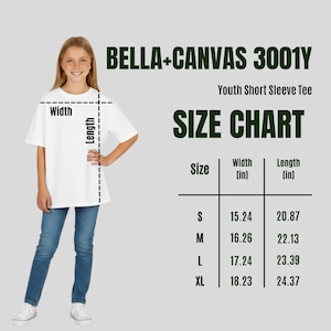 May include: A young person wearing a white short-sleeve tee shirt and blue jeans. The image includes a size chart for youth short sleeve tees, with measurements in inches for width and length. The brand is Bella+Canvas 3001Y.