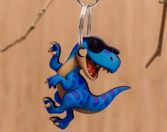 Chaveiro de dinossauro com óculos de sol, chaveiro de madeira dupla face, presente divertido de dinossauro, madeira de tília cortada a laser, fabricado na Bélgica.