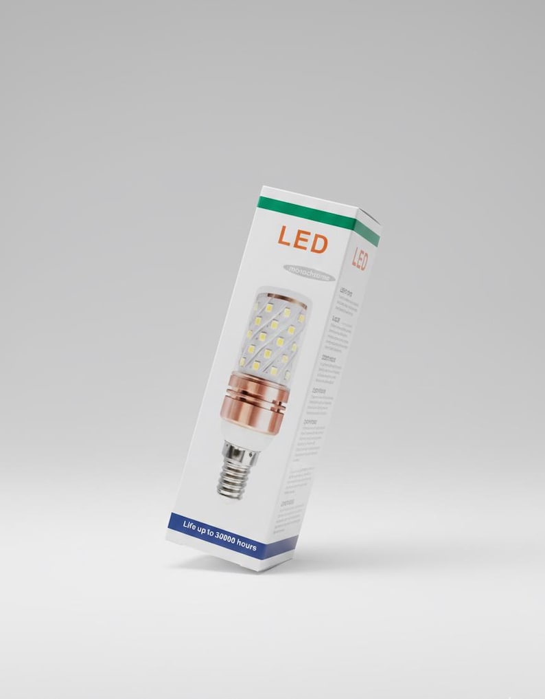 May include: An LED light bulb in a white box with green and blue accents. The box features the word "LED" in orange and the text "Life up to 30000 hours". The bulb has a copper-colored base and a silver screw-in base.