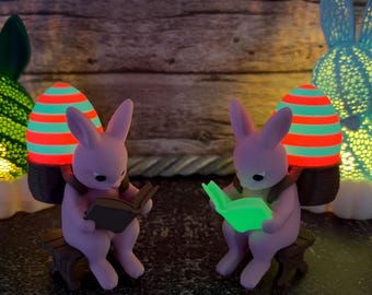 Reading Easter bunny with glowing egg, personalized Easter decoration, gift for book lovers, LED figure, glow in the dark, spring decoration