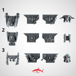 Może przedstawiać: Kolekcja szarych miniaturowych elementów dekoracyjnych, w tym czaszki zwierząt, panele dekoracyjne i ozdobne konstrukcje. Elementy charakteryzują się skomplikowanymi wzorami i fakturami, odpowiednimi do rękodzieła lub modelarstwa. Obraz jest na gładkim tle.
