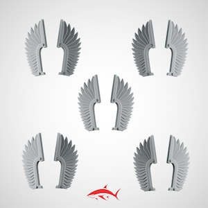 May include: Multiple sets of grey, stylized wings are displayed against a white backdrop. Each wing set comprises two separate pieces, resembling feathers. A red shark logo is at the bottom.