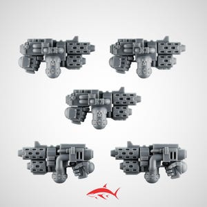May include: Five grey plastic toy guns with detailed designs, including barrels, handles, and decorative features. Each gun has a skull emblem and a complex design, suggesting a futuristic or fantasy theme. The image is set against a white background.