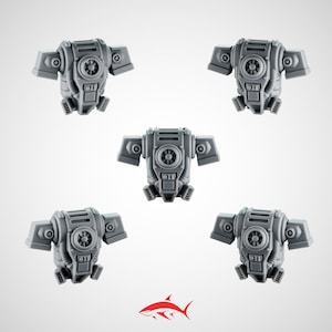 May include: Five grey miniature robot torsos are displayed against a white backdrop. Each torso features a circular central element, two side panels, and a lower section with mechanical detailing. A red shark logo is at the bottom.