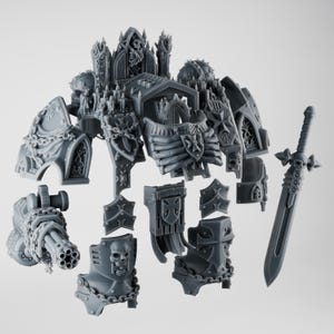 May include: A grey, unassembled miniature model kit featuring components of a gothic-style armored figure. The kit includes a large torso, shoulder pads, leg armour, a sword, and a multi-barrelled weapon. The pieces are detailed with skulls, chains, and religious symbols.