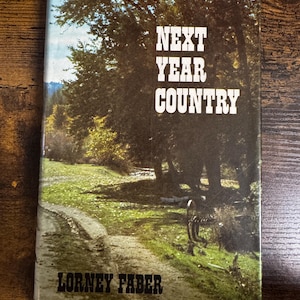 Next Year Country by Lorney Faber | 1975 First Edition Hardcover with Dust Jacket | Vintage Western Americana Memoir