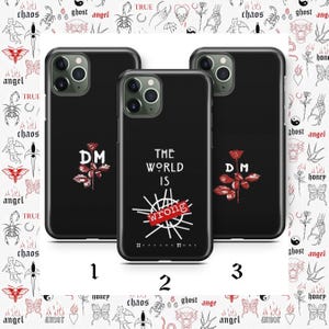 May include: Black phone cases with Depeche Mode-inspired designs. One case features "DM" with a red rose, another displays "THE WORLD IS wrong" with the band's logo, and the third has "DM" and a red rose. The cases are numbered 1, 2, and 3.