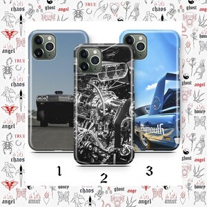 May include: Three phone cases with car-themed designs. One case features a black car on a road, another showcases a detailed engine, and the third displays a blue car with "Plymouth" text. The cases are numbered 1, 2, and 3.
